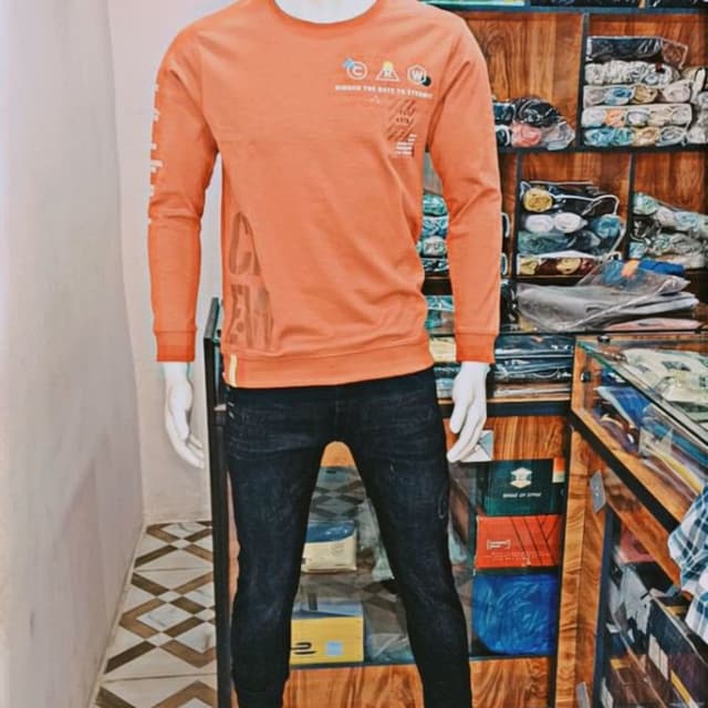 Orange, Black Sweatshirt, Jeans