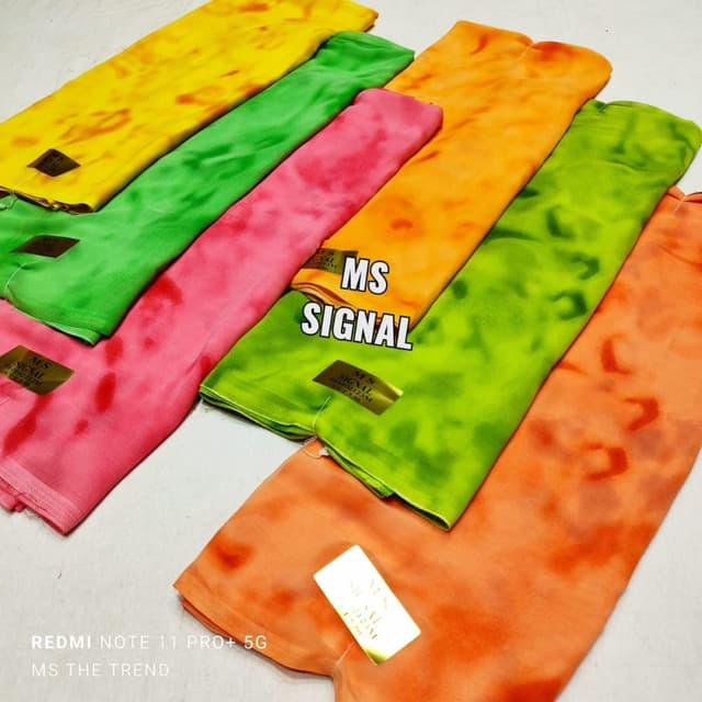 Vibrant shades of yellow, green, pink, orange Saree