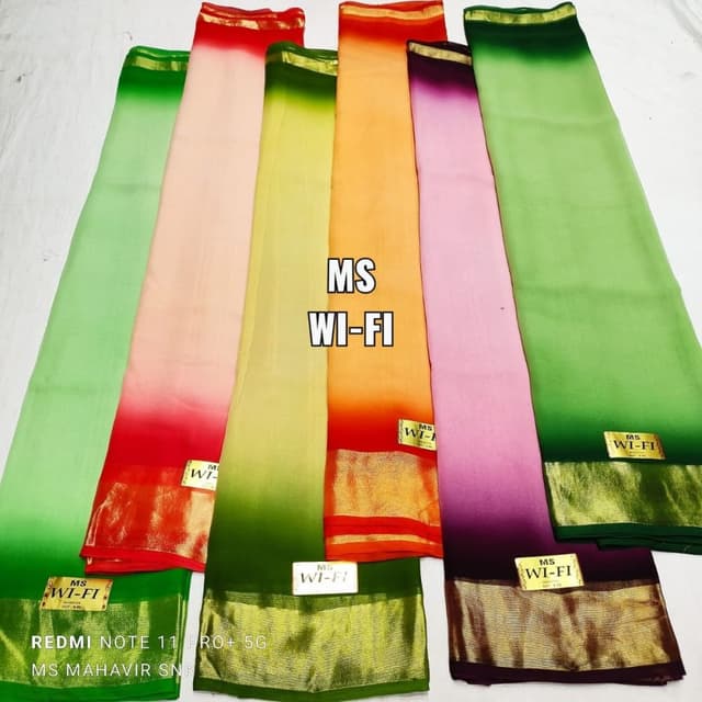 Various gradient colors like green to red, yellow to orange, pink to purple. Gold border. Sarees