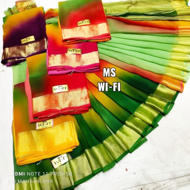 Multicolor with shades of green, yellow, orange, red, and purple. Saree