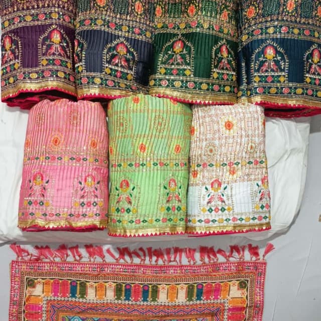 Various, including purple, navy, green, pink, and white with gold accents Lehenga Choli