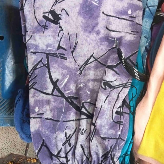 Purple, white, and black Leggings or similar pants