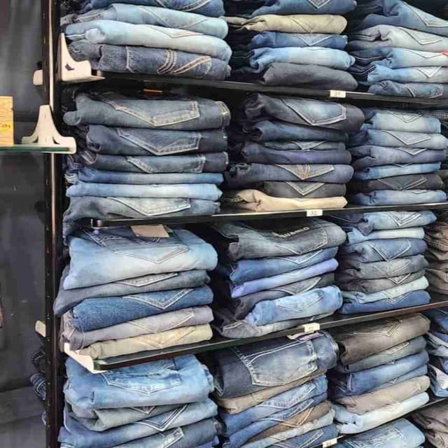 Various shades of blue, including light wash, medium wash, and dark wash with some gray tones. Jeans