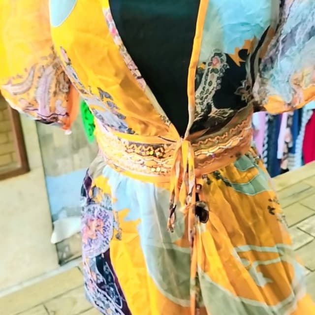 Yellow, orange, blue, and hints of purple and black Dress