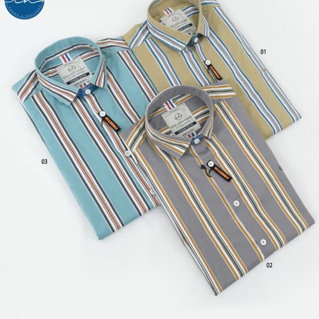 Various, with dominant colors of seafoam green, beige, and gray, accented by stripes in complementary shades such as white, brown, blue, and yellow. Shirt