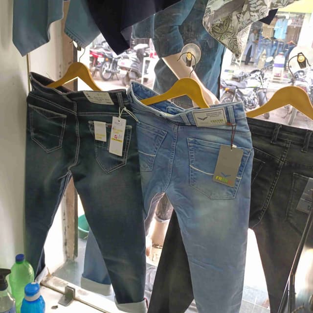 Various shades of blue and black denim Jeans