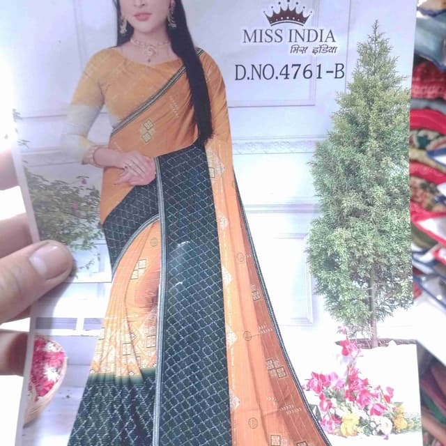 Mustard yellow, Black, and touches of white Saree