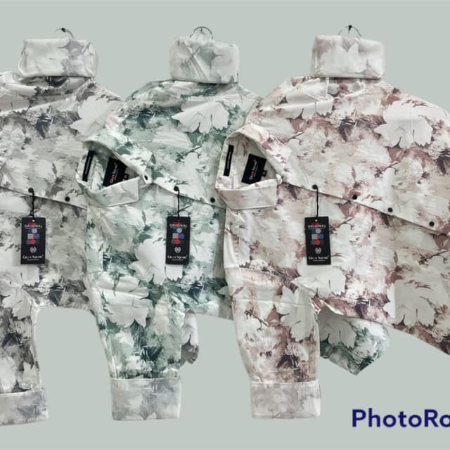 Varied shades of grey, green, and brown with white accents Shirt