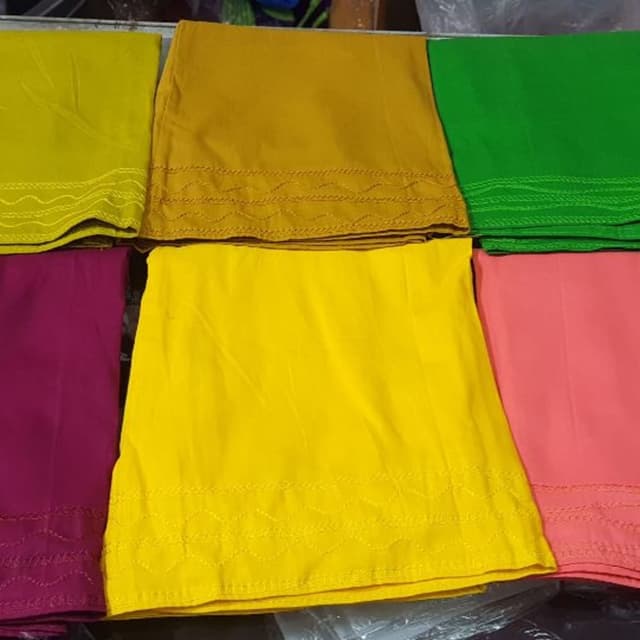 Various bright solid colors including yellow, green, pink, and purple. Bottom wear/Pants