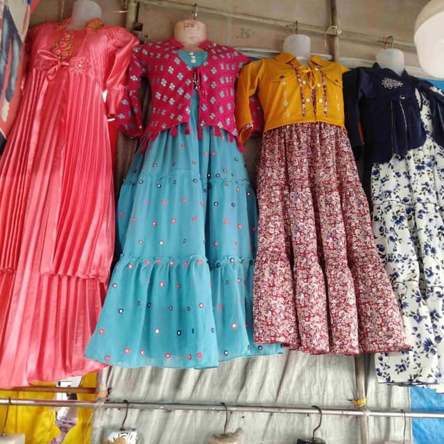Various, including Pink, Teal, Yellow, and White with Floral Prints Dress