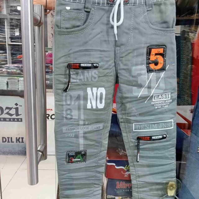 Gray with accents of black, white, and orange Jeans