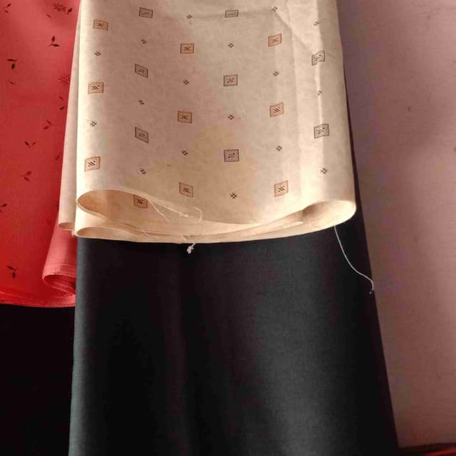 Off-white, black, and light red Fabric