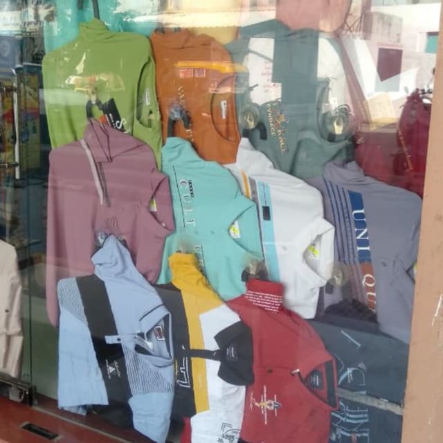 Various, including green, orange, pink, blue, yellow, white, black, and red T-shirts and Polo Shirts