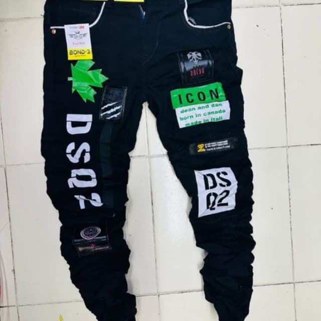 Black with white and green accents Jeans