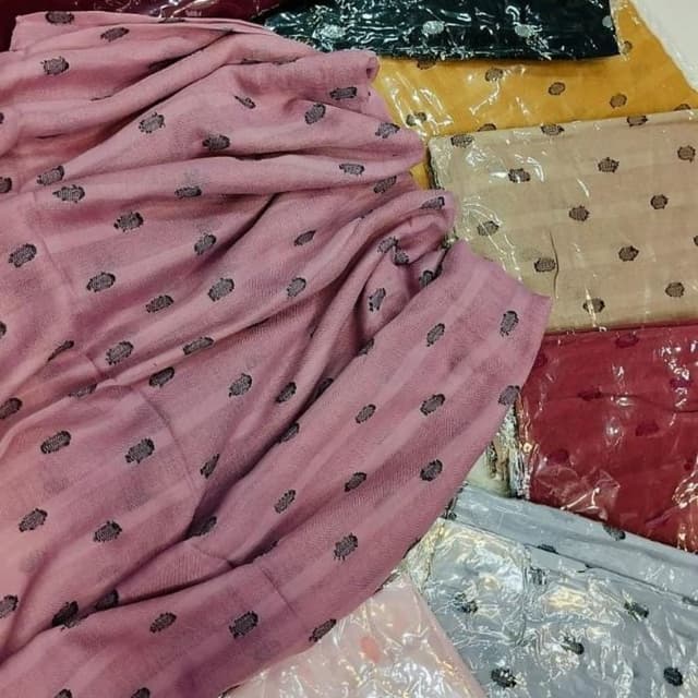 Pink with black accents, other colors such as gold, black, red, and beige are also visible. Scarf or Shawl