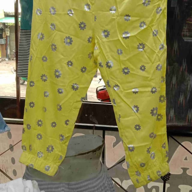 Yellow with silver and gray accents Pants