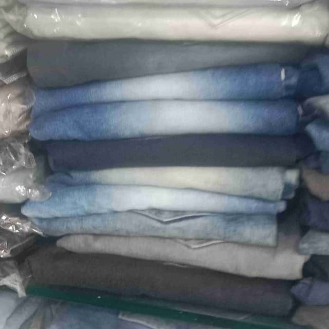 Various shades of blue, gray and white Jeans