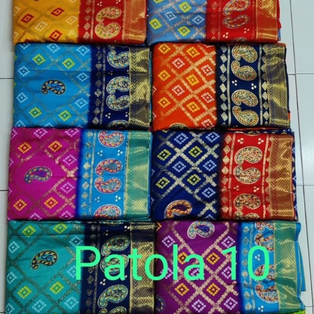 Vibrant and rich, with combinations like yellow and red, blue and gold, orange and navy, pink and blue, green and purple Sarees