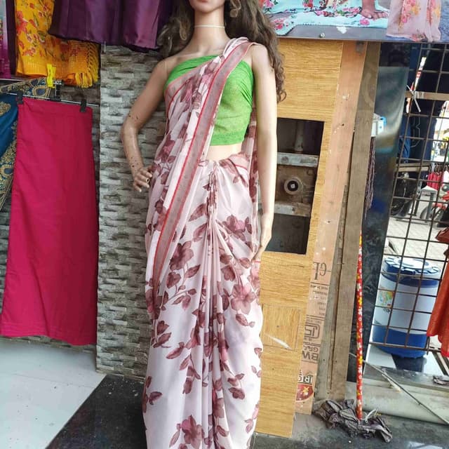 Soft pink, brown, and green Saree
