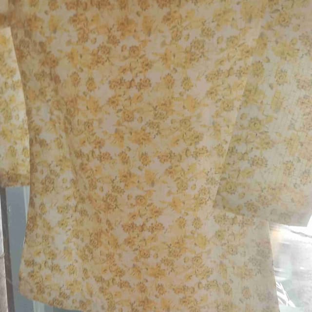 Yellow and white Fabric or Clothing