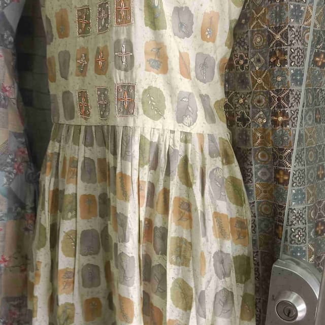 Soft cream, muted green, dusty orange, and gray Dress