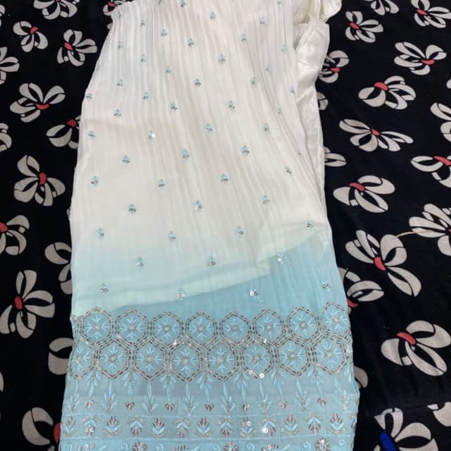 White and blue, with silver accents Dress or fabric piece