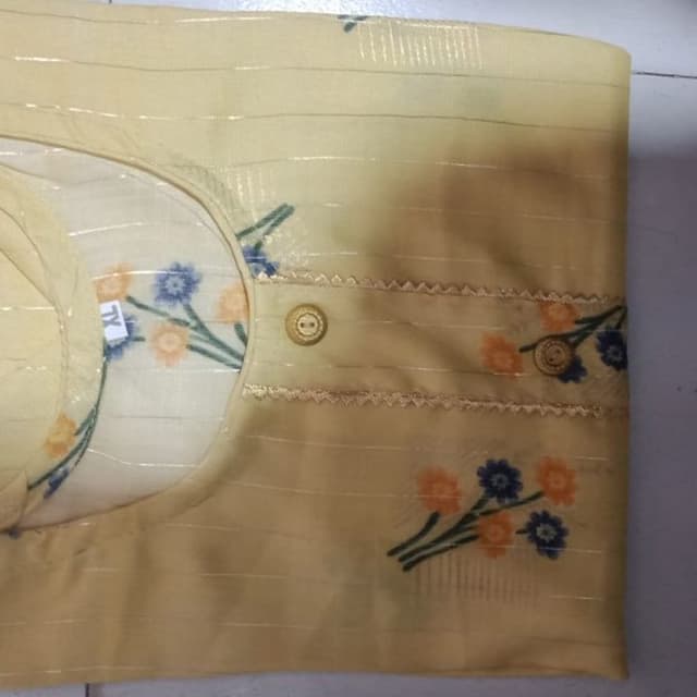 Pale yellow with floral accents in orange and blue Kurta/Top