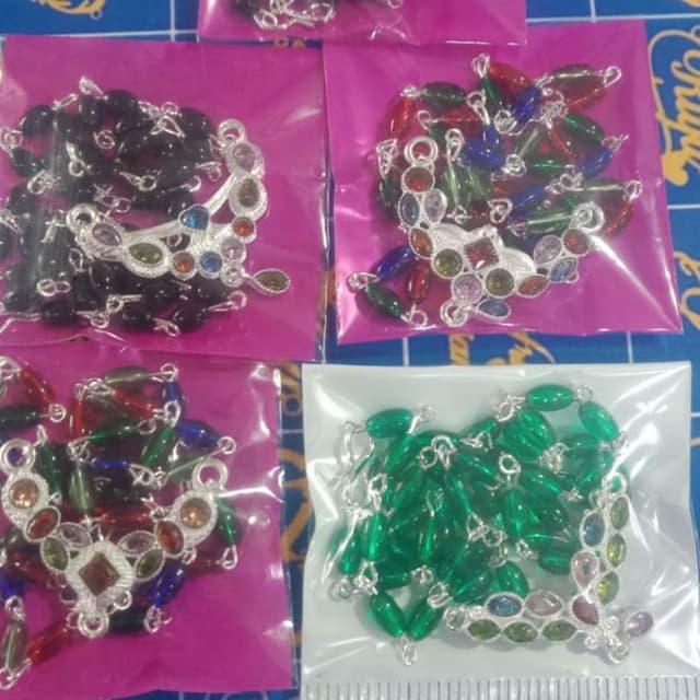 Multicolor gemstones with silver accents and black, green, red, and blue beads Necklace