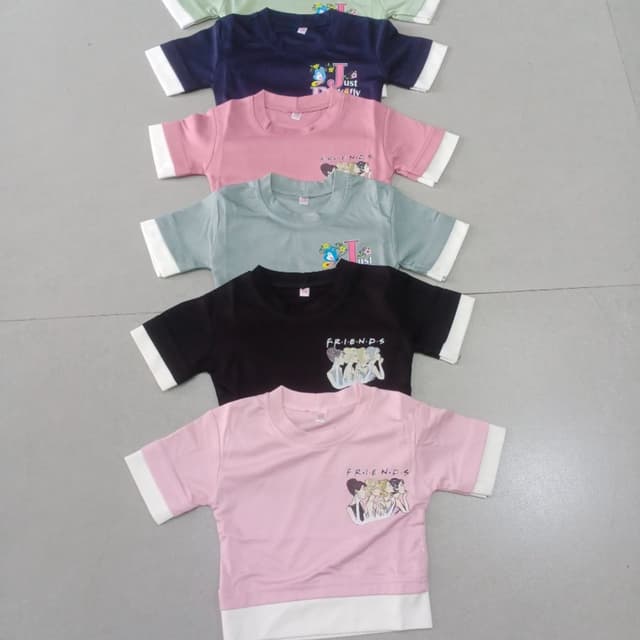 Various pastel colors including pink, black, blue, and green, with white accents T-shirt