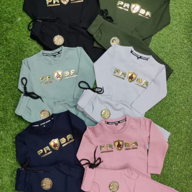 Various pastel colors including black, green, gray, pink, and navy blue with gold accents Tracksuit Set