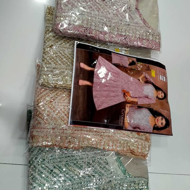 Various shades including pink, gold, and green with a sequin finish Dress