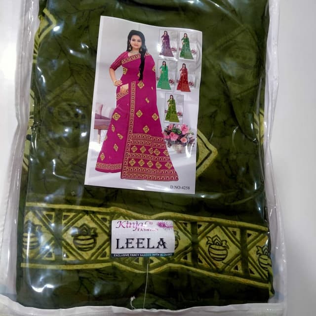 Green and Pink with golden accents Saree
