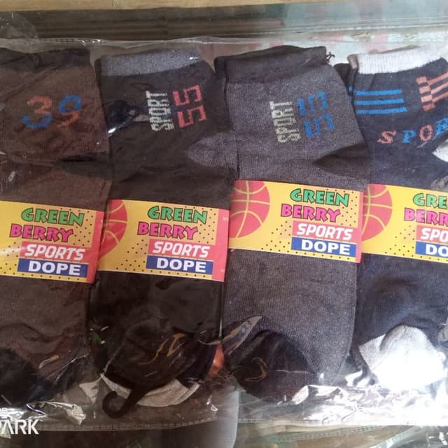 Various shades of gray, black, white, blue and red. Socks