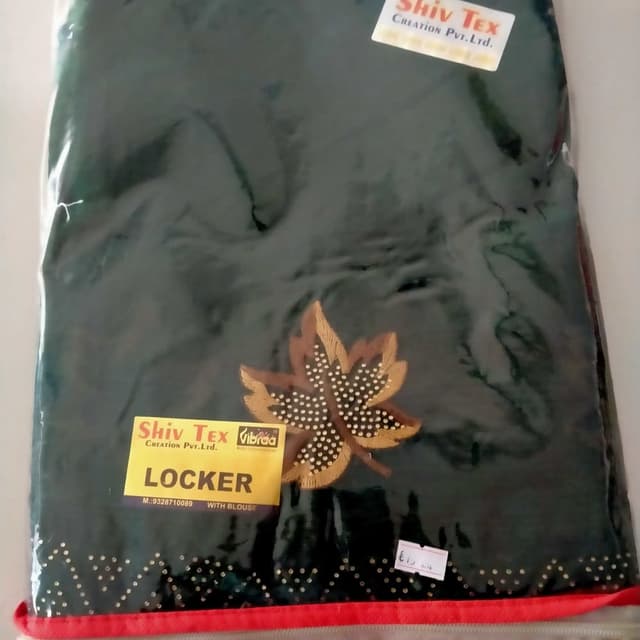 Dark Green with brown, gold, and white accents Saree