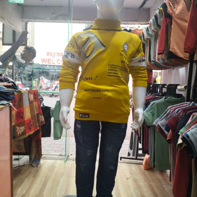 Yellow, White, Black, and Blue Sweatshirt and Jeans