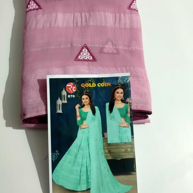 Pink, with hints of Purple and Green Saree