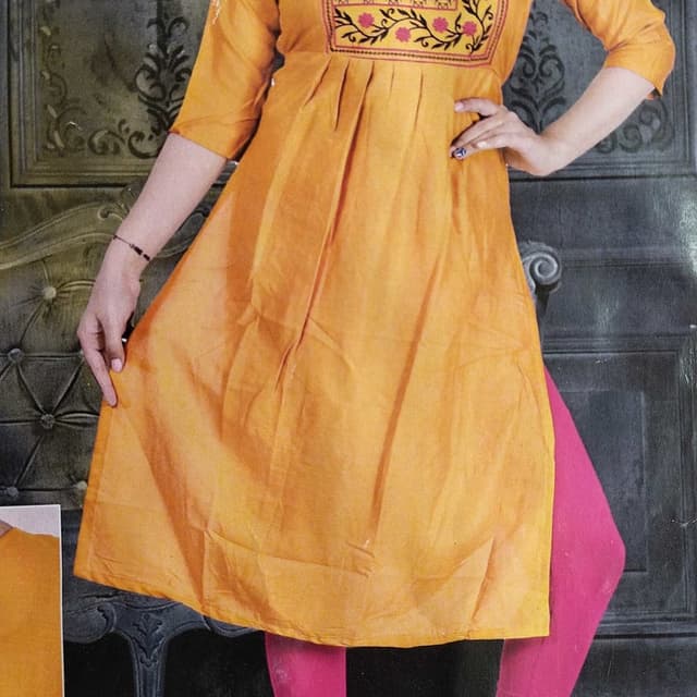 Mustard Yellow with accents of Pink and Black Kurti