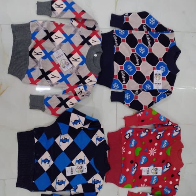 Various patterns, including blue, red, grey, and navy with white accents Sweaters