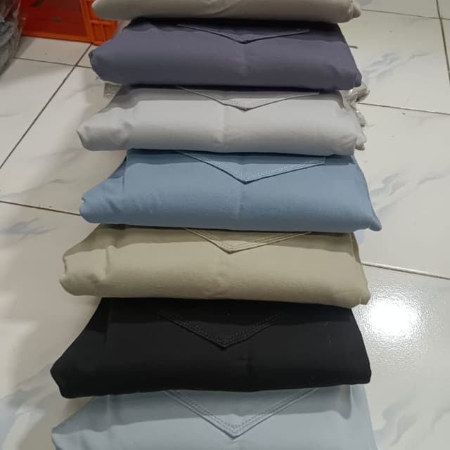 Various solid colors including grey, blue, black, and beige. Pants