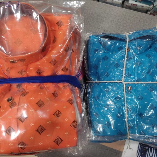 Orange and Blue with black and white accents Kurta