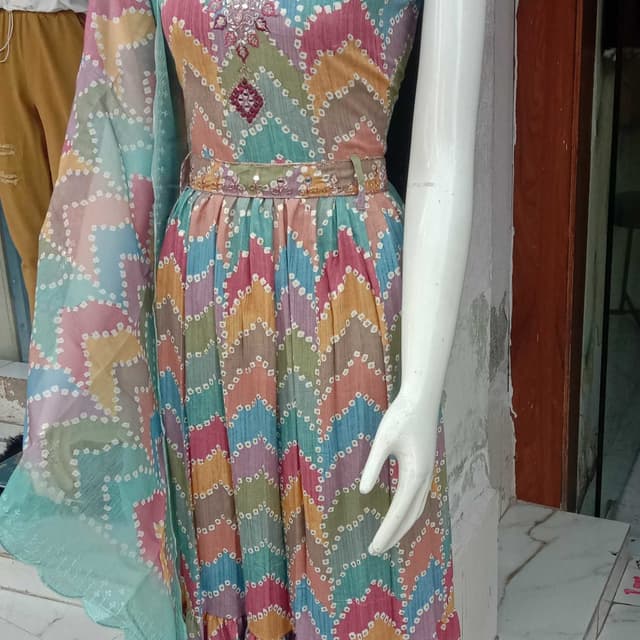 Multi-colored with dominant shades of turquoise, pink, orange, purple, and brown Dress