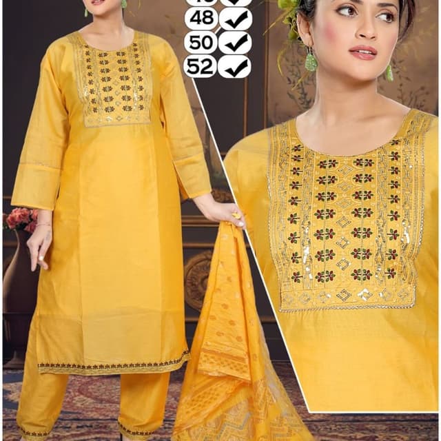 Yellow, with hints of red, green and silver in the embroidery Salwar Kameez