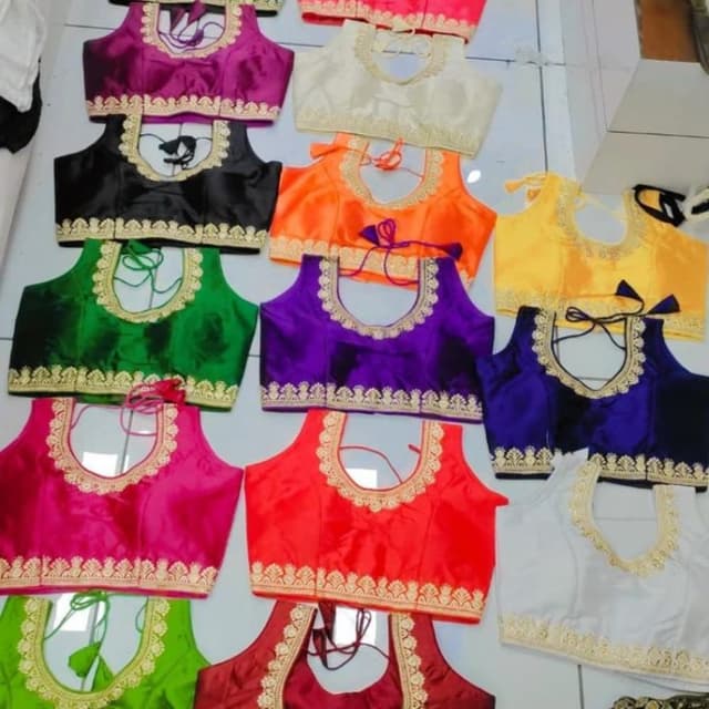 Various, including black, green, pink, red, purple, orange, yellow, blue, white, and maroon Blouse