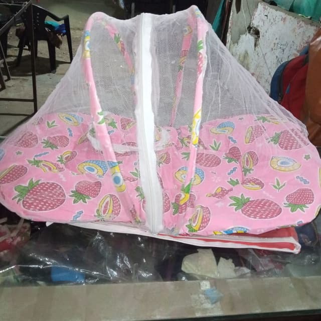 Pink, White, and Multi-colored Fruits Baby Bassinet with Mosquito Net