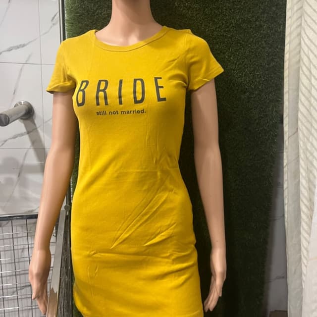 Mustard yellow with black text T-shirt dress