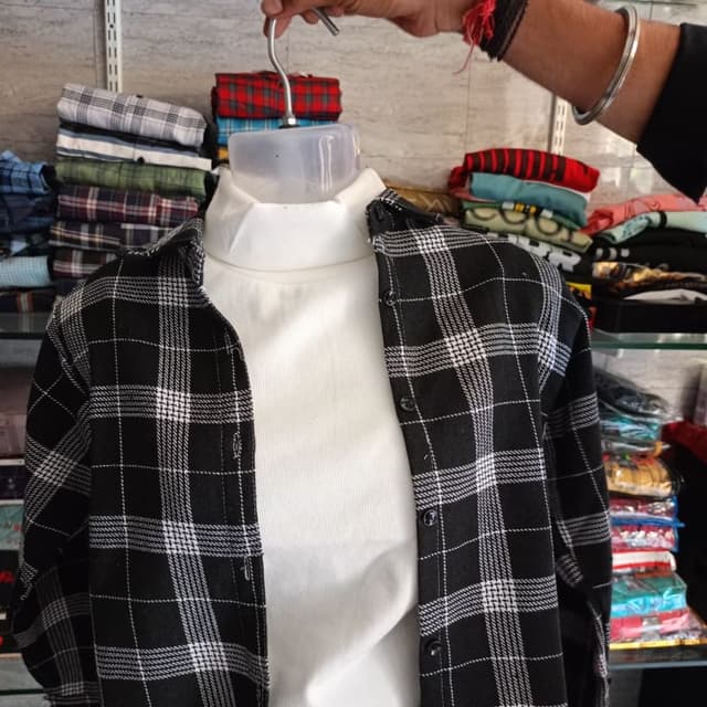 Black and white, with a white base layer Shirt