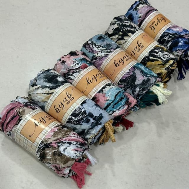 Various, including pink, blue, black, white, and brown, in a marbled or watercolor effect Hijab/Scarf