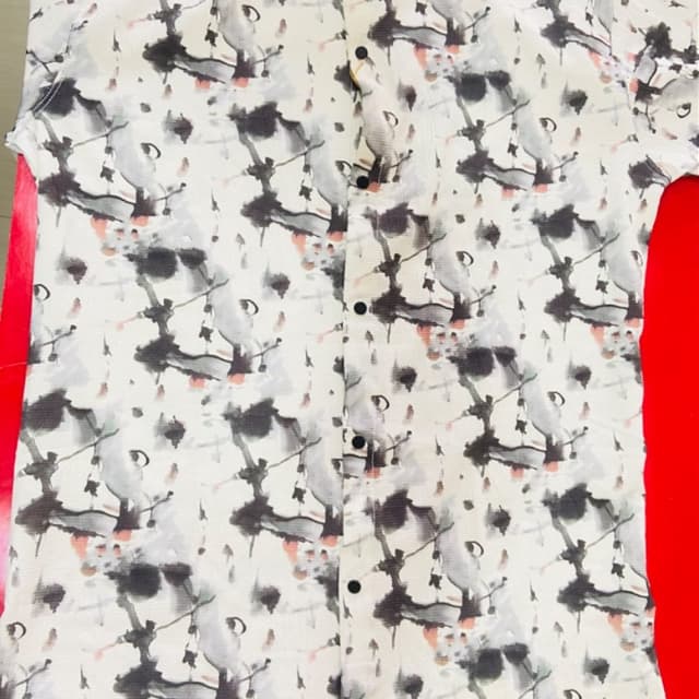 White, Black, Gray, and Peach Shirt