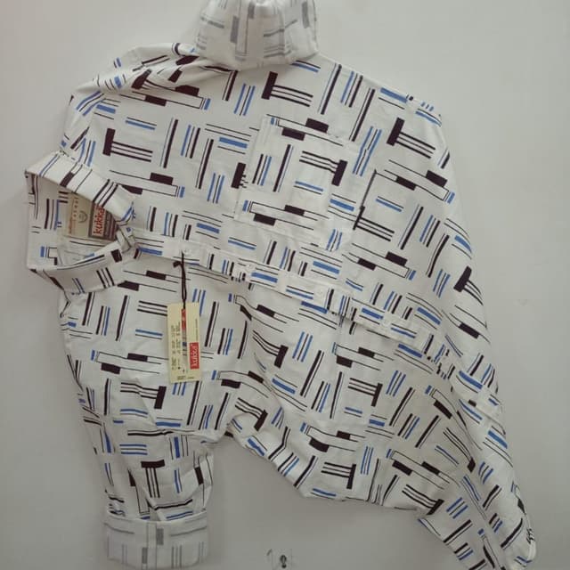 White, Black, Blue Shirt
