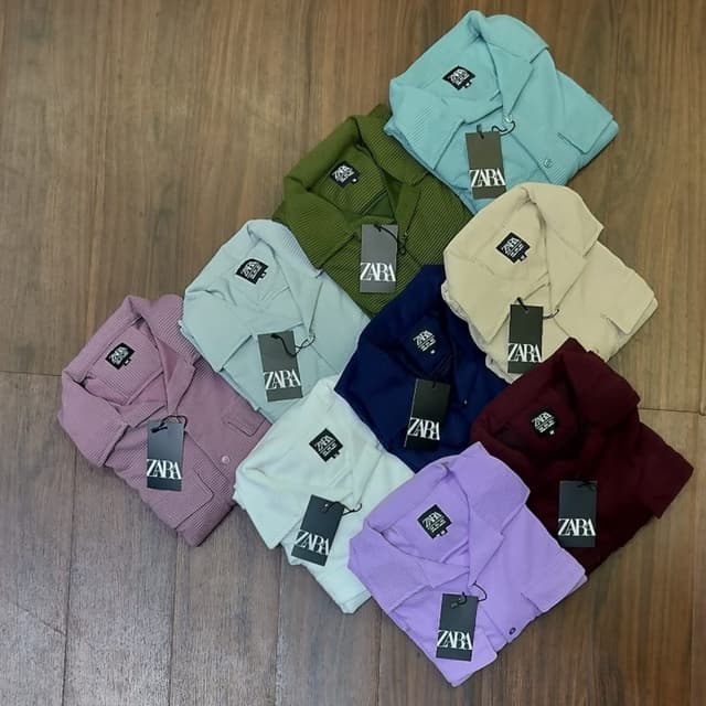 Various pastel and jewel tones including: light blue, olive green, light green, beige, navy blue, burgundy, lavender, and a mauve-pink. Shirt